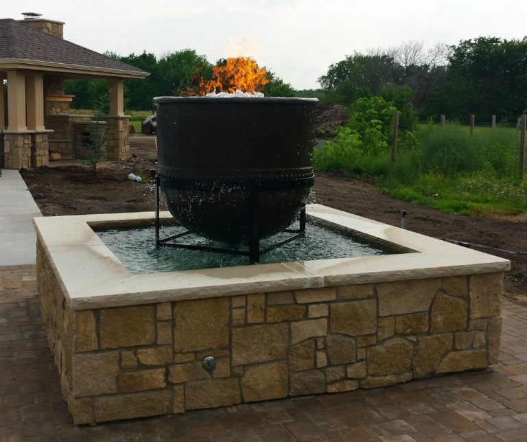 Cast Iron Fire Pit Installation in Lawrence, KS Landscaper